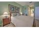 Spacious bedroom with a double bed and en-suite bathroom access at 8047 Victoria Falls Cir, Sarasota, FL 34243