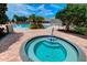 Relaxing community hot tub with surrounding patio at 8047 Victoria Falls Cir, Sarasota, FL 34243