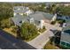 Aerial view of a community of villas with a lake at 4629 Whirlaway Dr # B, Sarasota, FL 34233