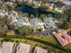 Aerial view of a lakefront villa community at 4629 Whirlaway Dr # B, Sarasota, FL 34233