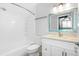 Clean bathroom with a white vanity and tiled shower/tub combo at 4629 Whirlaway Dr # B, Sarasota, FL 34233