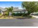 Exterior view of house with landscaping and driveway at 4629 Whirlaway Dr # B, Sarasota, FL 34233