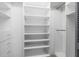 Spacious walk-in closet with ample shelving and hanging space at 4629 Whirlaway Dr # B, Sarasota, FL 34233