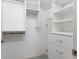 Large walk-in closet with shelves, drawers and hanging space at 4629 Whirlaway Dr # B, Sarasota, FL 34233