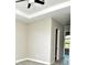 Spacious bedroom with ceiling fan and ample closet space at 8233 Givlic Ln, North Port, FL 34287