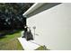 House exterior showcasing water filtration system at 8233 Givlic Ln, North Port, FL 34287