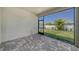 Screened-in porch with paver floor, offering a peaceful outdoor space at 5770 Long Shore Loop, Sarasota, FL 34238