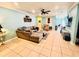 Spacious living room with sectional sofa and Gathering wall art at 3920 Willow Walk Dr, Palmetto, FL 34221