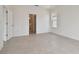 Bedroom with tile floors and access to bathroom and closet at 19642 Fort King Run, Brooksville, FL 34601