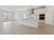 Modern kitchen with island, stainless steel appliances, and white cabinetry at 19642 Fort King Run, Brooksville, FL 34601