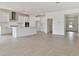 Modern kitchen with white cabinets and breakfast bar at 19642 Fort King Run, Brooksville, FL 34601