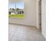 Bright dining room features tile flooring and a view of the backyard at 5307 Cappleman Loop, Brooksville, FL 34601