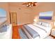 Spacious Primary bedroom with a king-size bed and ensuite bathroom at 4264 Central Sarasota Pkwy # 116, Sarasota, FL 34238