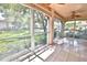 Spacious sunroom with sliding glass doors and a view of the surrounding area at 4264 Central Sarasota Pkwy # 116, Sarasota, FL 34238