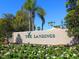 The Landings community entrance with attractive landscaping at 5228 Landings Blvd # 202, Sarasota, FL 34231