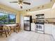 Well-equipped kitchen with stainless steel appliances and granite counters at 5228 Landings Blvd # 202, Sarasota, FL 34231