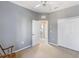 Cozy bedroom features neutral carpet, closet space, and an en-suite bathroom at 5654 Simonton St, Bradenton, FL 34203