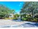 Charming yellow building with lush landscaping, creating an inviting atmosphere in the community at 5654 Simonton St, Bradenton, FL 34203