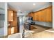 Well-equipped kitchen featuring granite countertops, stainless steel appliances, and ample cabinet space at 5654 Simonton St, Bradenton, FL 34203