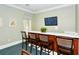 Community lounge area with comfortable seating and a large flat screen TV at 5654 Simonton St, Bradenton, FL 34203