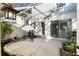 Private patio featuring a screened enclosure, water feature, and outdoor plants at 5654 Simonton St, Bradenton, FL 34203