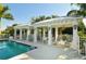 Community pool features cabanas and poolside seating at 5654 Simonton St, Bradenton, FL 34203