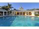 Large community pool with fountain and community center at 5654 Simonton St, Bradenton, FL 34203