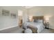 Cozy bedroom with a comfortable bed and en-suite bathroom access at 701 Sigsbee Loop, Sarasota, FL 34240