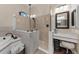 Bathroom with walk-in shower, soaking tub, and vanity at 531 Ranger Ln, Longboat Key, FL 34228