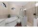 Spa-like bathroom with soaking tub and walk-in shower at 531 Ranger Ln, Longboat Key, FL 34228