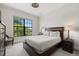 Cozy bedroom with large window, and plenty of natural light at 531 Ranger Ln, Longboat Key, FL 34228