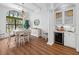 Bright dining room with hardwood floors and large window at 531 Ranger Ln, Longboat Key, FL 34228