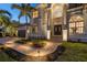 Elegant home entrance with columns and landscaping at 531 Ranger Ln, Longboat Key, FL 34228