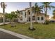 Two-story house with lush landscaping and palm trees at 531 Ranger Ln, Longboat Key, FL 34228