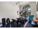 Home gym with various exercise equipment including treadmill and elliptical at 531 Ranger Ln, Longboat Key, FL 34228