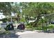 Golf cart parking area at the community clubhouse at 2383 Harbour Oaks Dr, Longboat Key, FL 34228