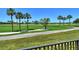 Enjoy breathtaking views of the lush green golf course at 2383 Harbour Oaks Dr, Longboat Key, FL 34228