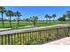 Spacious patio with a view of the golf course at 2383 Harbour Oaks Dr, Longboat Key, FL 34228