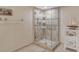 Large walk-in shower with glass enclosure and modern tile at 2383 Harbour Oaks Dr, Longboat Key, FL 34228