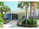 Modern clubhouse at the community tennis facility at 2383 Harbour Oaks Dr, Longboat Key, FL 34228