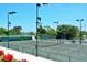 Well-maintained tennis courts with ample lighting at 2383 Harbour Oaks Dr, Longboat Key, FL 34228