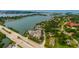 Aerial view showing building location and waterfront access at 516 Tamiami S Trl # 102, Nokomis, FL 34275