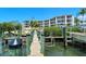 Luxury condo building with waterfront views and boat dock at 516 Tamiami S Trl # 102, Nokomis, FL 34275