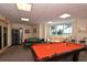 Community game room featuring a pool table and seating at 516 Tamiami S Trl # 102, Nokomis, FL 34275