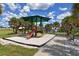 Playground with slide and shaded area at 516 Tamiami S Trl # 102, Nokomis, FL 34275