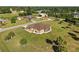 Aerial view of single-story home with large yard and surrounding community at 2479 Grandview Dr, North Port, FL 34288