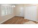 Bright dining area with wood floors and plantation shutters at 2479 Grandview Dr, North Port, FL 34288