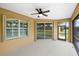 Peaceful screened porch overlooking the backyard at 2479 Grandview Dr, North Port, FL 34288