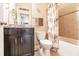 Charming bathroom includes a tub and granite countertop at 3129 Oriole Dr # 104, Sarasota, FL 34243