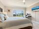 Spacious bedroom with water views and a workspace at 100 Sands Point Rd # 305, Longboat Key, FL 34228